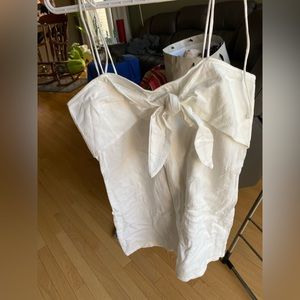 white dress with bow at front